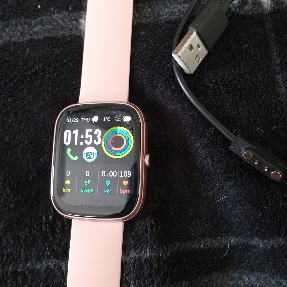 Elegant Pink Smartwatch with USB Charger